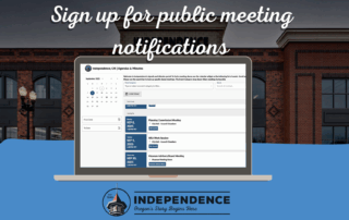 a graphic that is a laptop with the agenda interface on the screen. city hall is in the background. the city's logo is underneath the laptop